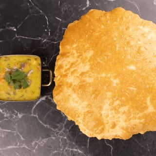 Bature Aloo Tomato Curry